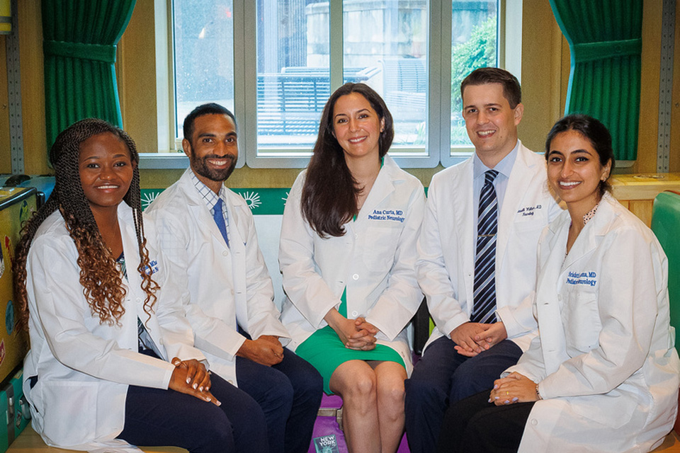 Group of Child neuro fellows sitting in a train car