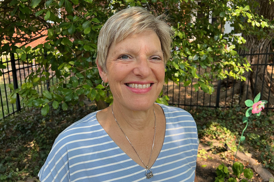 Denise Côté-Arsenault, Ph.D., poses for a photo in her backyard.