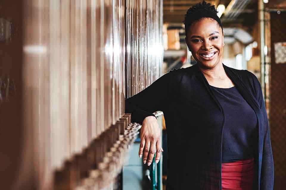 African American woman smiles at the camera