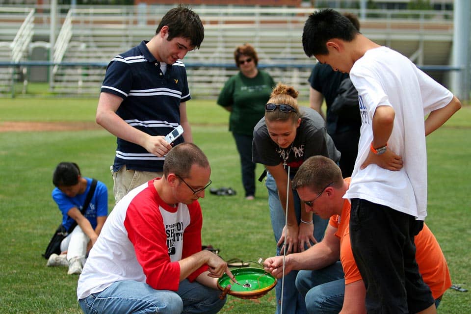 Sullivan and her teammates work on the "frocket," a flat circular device