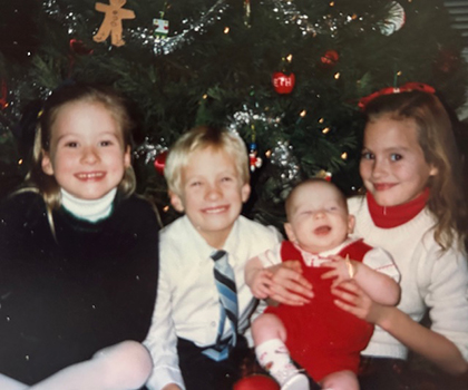 Beth O'Leary as a child with her three siblings